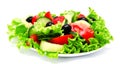 Fresh vegetable salad isolated on a white Royalty Free Stock Photo