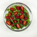 Fresh vegetable salad plate. Step 3 - raspberries. Royalty Free Stock Photo