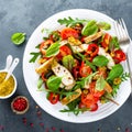 Fresh vegetable salad plate of tomatoes, spinach, pepper, arugula, chard leaves and grilled chicken breast. Fried chicken meat, fi Royalty Free Stock Photo