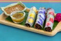 Fresh Vegetable Salads Roll with Colorful Flower and Sauce