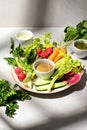 Fresh vegetable snack with healthy vegan dips