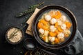 Fresh vegetable soup with meatballs and pearl barley in bowl on black background Royalty Free Stock Photo