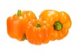 Three bulgarian peppers, orange variety, close-up on a white background