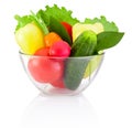 Fresh vegetable in transparent bowl on white background