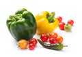 Fresh vegetables bell peppers, cherry tomatoes and chili close-up isolated on white background Royalty Free Stock Photo