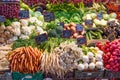 Fresh vegetables at the central market in Budapest, Hungary. Carrots, cabbage, cole, broccoli, radish, herbs, eggplant