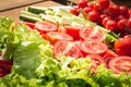Fresh vegetables closeup: lettuce, tomatoes, cucumbers Royalty Free Stock Photo