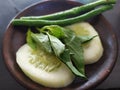 fresh vegetables / cucumber, basil, beans on a plate