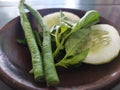 fresh vegetables / cucumber, basil, beans on a plate