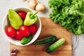 Fresh vegetables on a cutting board, salad ingredients Royalty Free Stock Photo