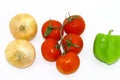 Fresh vegetables are depicted on top on a white background Royalty Free Stock Photo