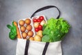 Fresh vegetables and fruits in natural eco friendly cotton bags top view. Zero waste food shopping and plastic free concept Royalty Free Stock Photo