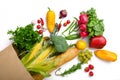 Fresh vegetables and fruits in paper bag, top view Royalty Free Stock Photo