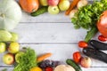 fresh vegetables, fruits on wooden background, pumpkins, zucchini, carrots, cucumbers, plums, greens, healthy food, dill, parsley Royalty Free Stock Photo