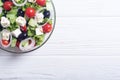 Fresh vegetables greek salad Healthy food on wooden background Royalty Free Stock Photo