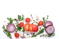 Fresh vegetables and herbs on a white background