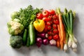 Fresh vegetables arranged on a table including broccoli, carrots, and tomatoes in a kitchen setting Royalty Free Stock Photo