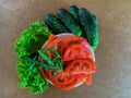 Fresh vegetables. Lettuce leaves, tomato, cucumber. rukola