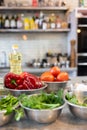 Fresh Vegetables lie in a metal bowls: tomatoes, asparagus, cucumbers, green. Fresh Vegetables lie in a metal bowls