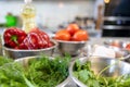 Fresh Vegetables lie in a metal bowls: tomatoes, asparagus, cucumbers, green. Fresh Vegetables lie in a metal bowls