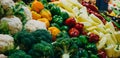 Fresh vegetables on the market counter. Different vegetables on the table: peppers, cabbage, turnips, broccoli. Red, green, white Royalty Free Stock Photo