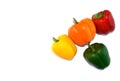 Fresh vegetables. Orange, yellow, green, red bell peppers or capsicum isolated on white background Royalty Free Stock Photo