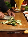 Fresh Vegetables - Professional Chefs is preparing Food on a wooden cutting Board