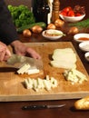 Fresh Vegetables - Professional Chefs is preparing Food on a wooden cutting Board