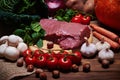 Fresh vegetables and raw meat on a sacking Royalty Free Stock Photo