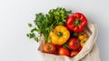 Fresh vegetables in a reusable shopping bag on a white background. Top view. Generative AI