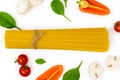 Fresh vegetables and spaghetti, ingredients for making pasta. Cooking and healthy Royalty Free Stock Photo