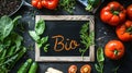 fresh vegetables on the table plate for text with the inscription bio