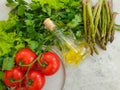 Fresh vegetables, tomato, oil background cookingn food