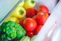 Fresh vegetables, tomatoes, peppers, cucumbers, broccoli, squash, zucchini in the refrigerator drawer for vegetables Royalty Free Stock Photo