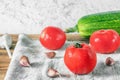 Fresh vegetables tomatoes, zucchini and garlic cloves Royalty Free Stock Photo