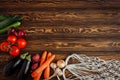 Fresh vegetables on wood. Flat lay with free space for text