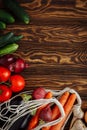 Fresh vegetables on wood. Flat lay with free space for text