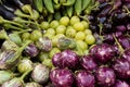 Fresh veggie basket from the Colaba Market farmer`s market: onions, aubergines, scallions, shallots, lady`s fingers Royalty Free Stock Photo