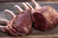 Fresh venison back on a wooden background