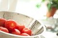 Fresh, Vibrant Roma Tomatoes in Colander with Wate Royalty Free Stock Photo