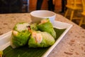 Fresh vietnamese spring rolls with peanut butter sauce for dipping. Royalty Free Stock Photo