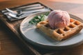 Fresh waffles with a strawberry ice cream in the plate Royalty Free Stock Photo