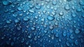 Fresh water droplets on a blue surface. Royalty Free Stock Photo