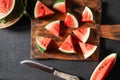 Fresh water melon slices on a wooden cutting board Royalty Free Stock Photo