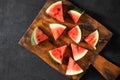 Fresh water melon slices on a wooden cutting board Royalty Free Stock Photo