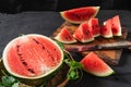 Fresh water melon slices on a wooden cutting board Royalty Free Stock Photo