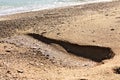 A fresh water spring flows from the beach