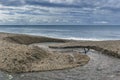 Fresh water stream going into the sea