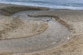 Fresh water stream going into the sea