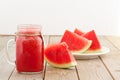 Fresh watermelon blending in glass on wood table Royalty Free Stock Photo